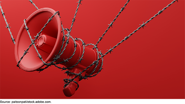 An image of a megaphone wrapped in barbed wire